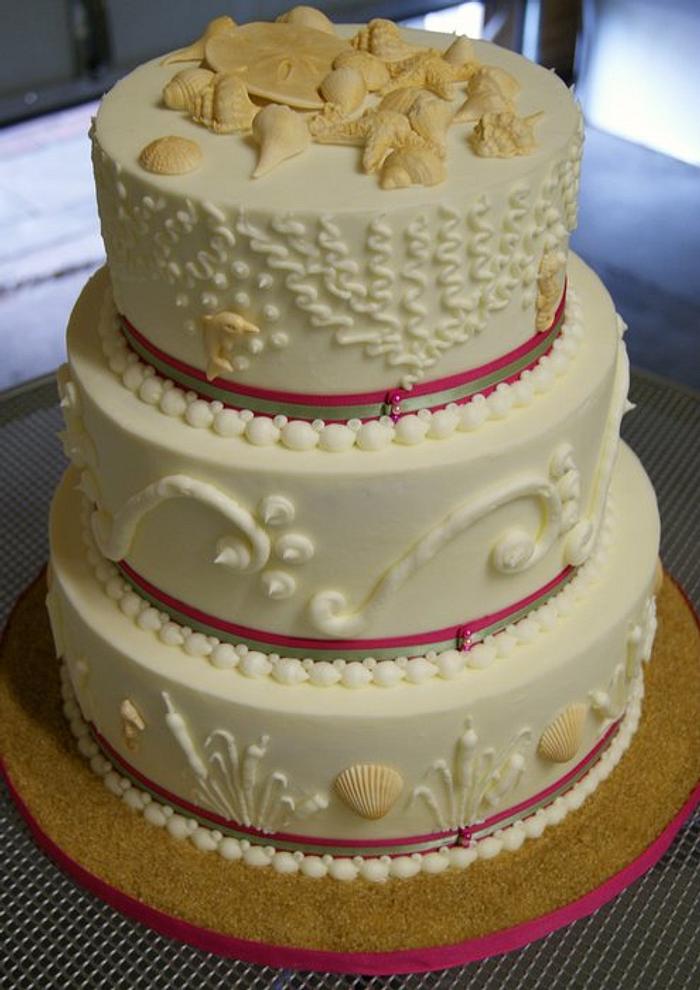 Hot pink and sage beach wedding cake