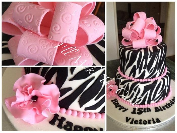 Zebra print cake with a loopy bow.