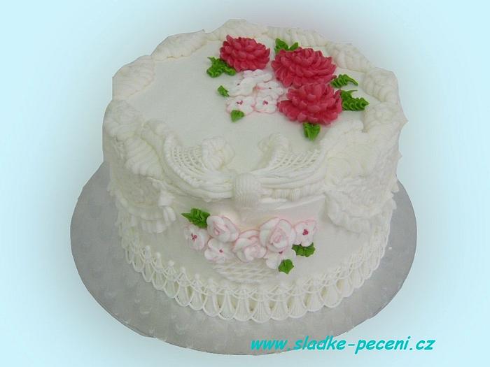 Royal icing cake with piped flowers and trellis work