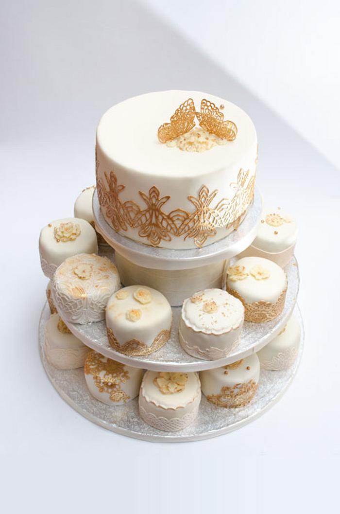 small wedding cakes in champagne and gold