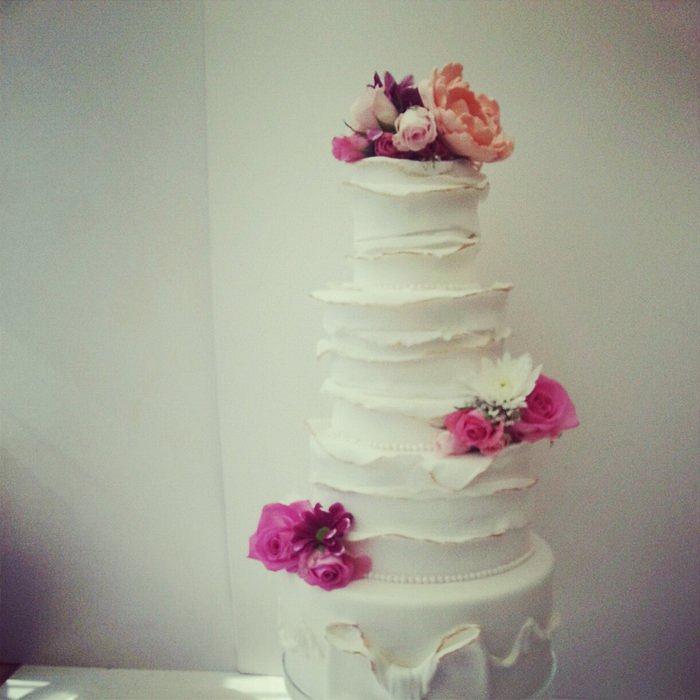 white ruffle wedding cake.