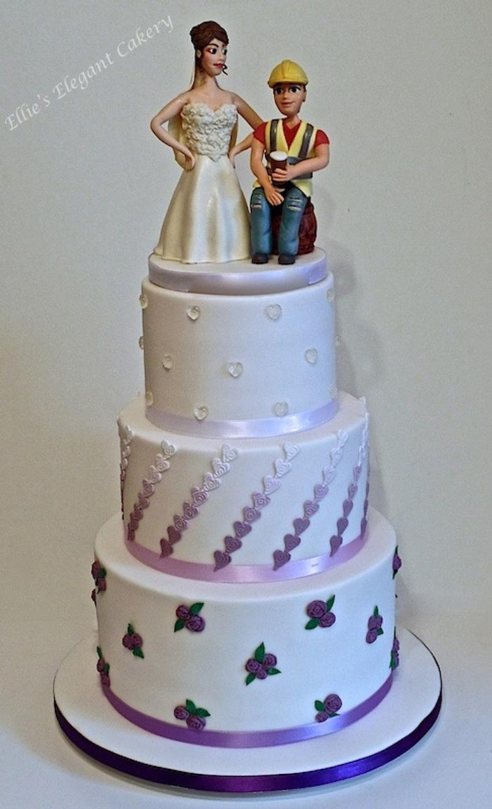 Purple roses and hearts wedding cake