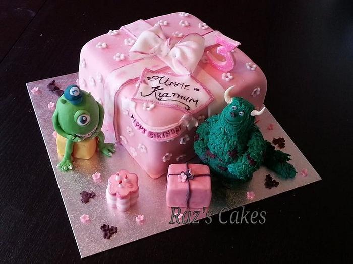 Mike and Sully present cake