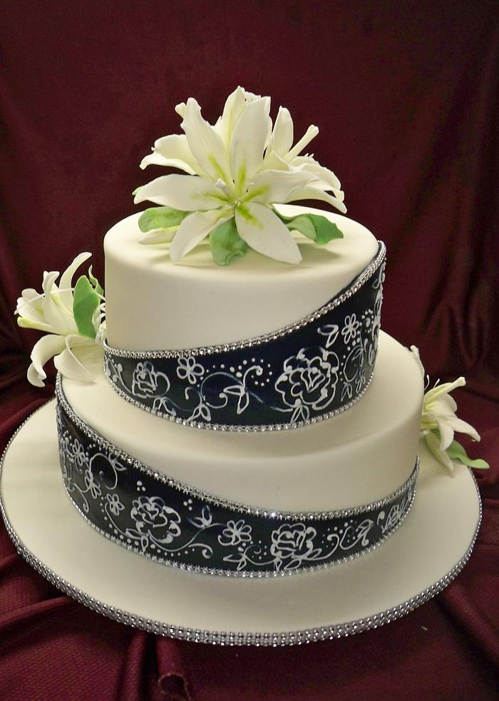 navy blue and white wedding cake