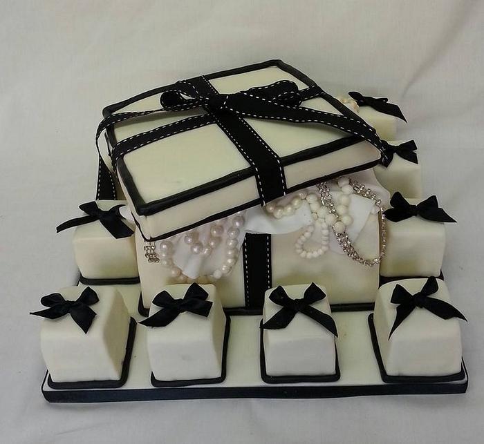 Links of London style box cake with mini cakes