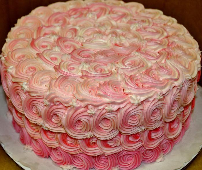 pink rosette buttercream cake