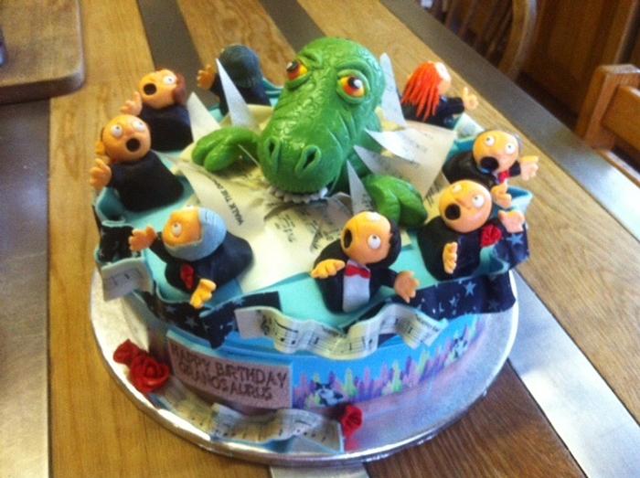 SHOWSTOPPER CAKE    dinosaur cake for a choral singer