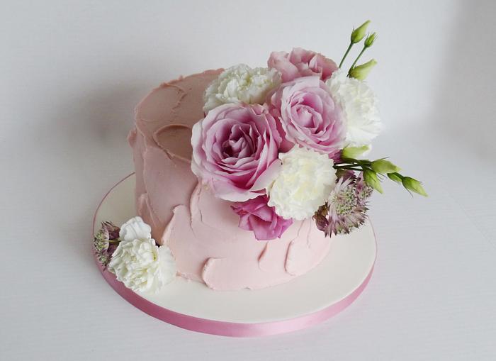 Rustic buttercream and fresh flowers