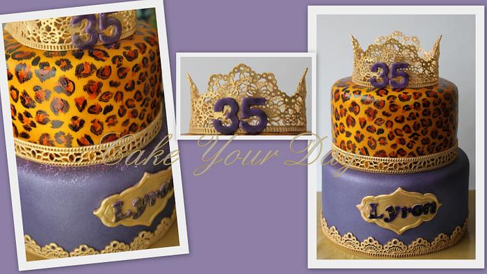 Leopard print, gold and purple cake.