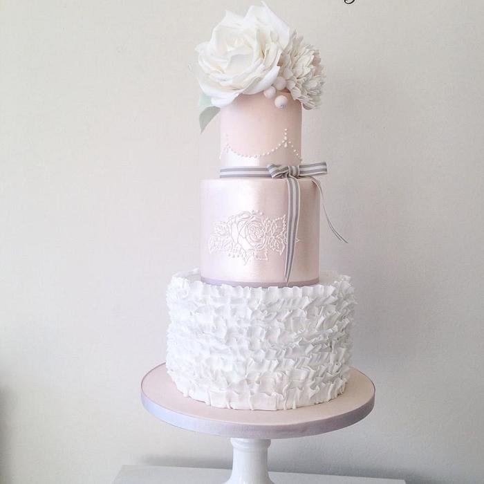 ruffles & roses wedding cake in ivory and blush 