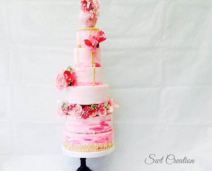 Hand painted pink ombré wedding cake 