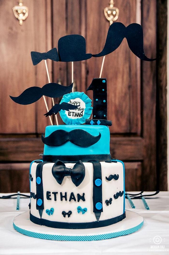A moustache theme cake.