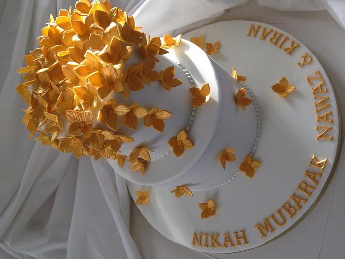 Gold hydrangea wedding cake