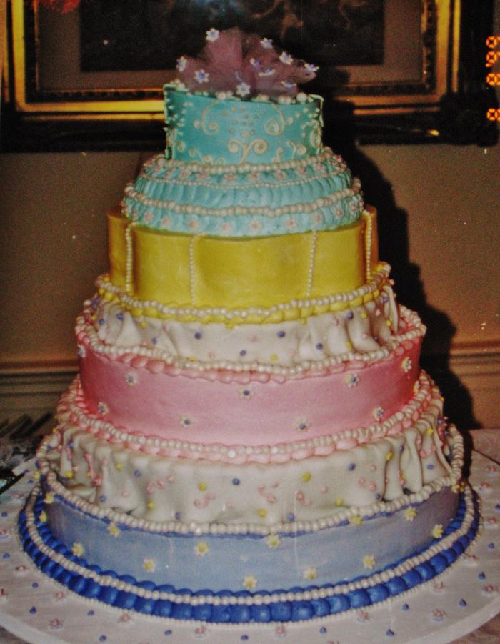 Whimsical wedding cake in buttercream