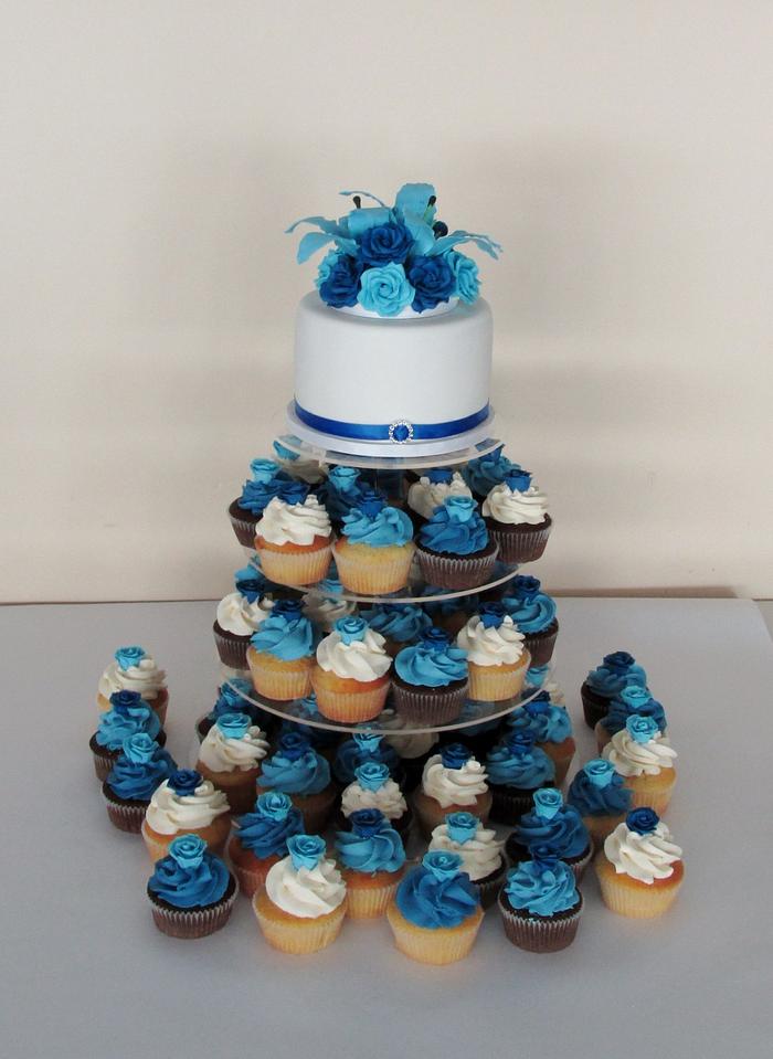 Blue wedding cupcake tower.