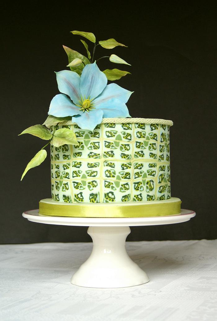 Green cake and blue clematis