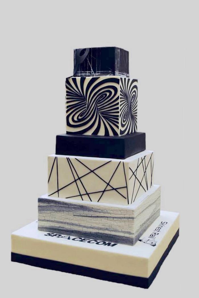 Black and white illusion cake! You will get dizzy! :)