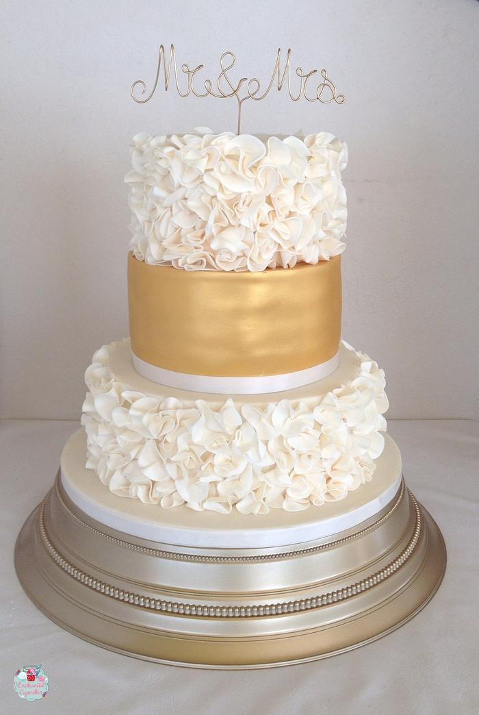 Ruffles and gold wedding cake