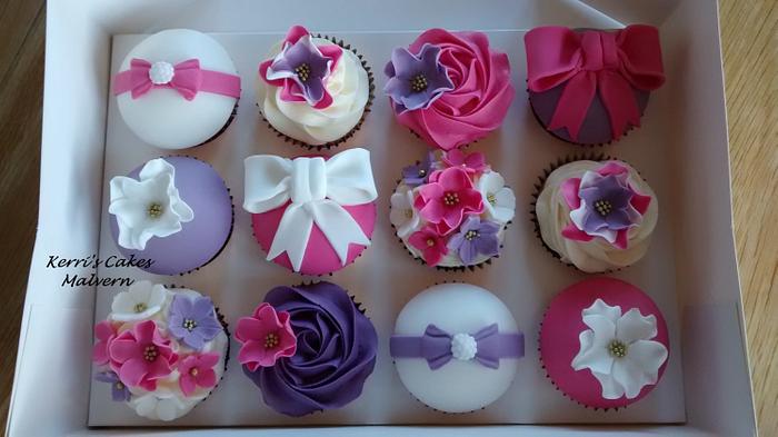 Pink & purple flowers & bows birthday cupcakes 