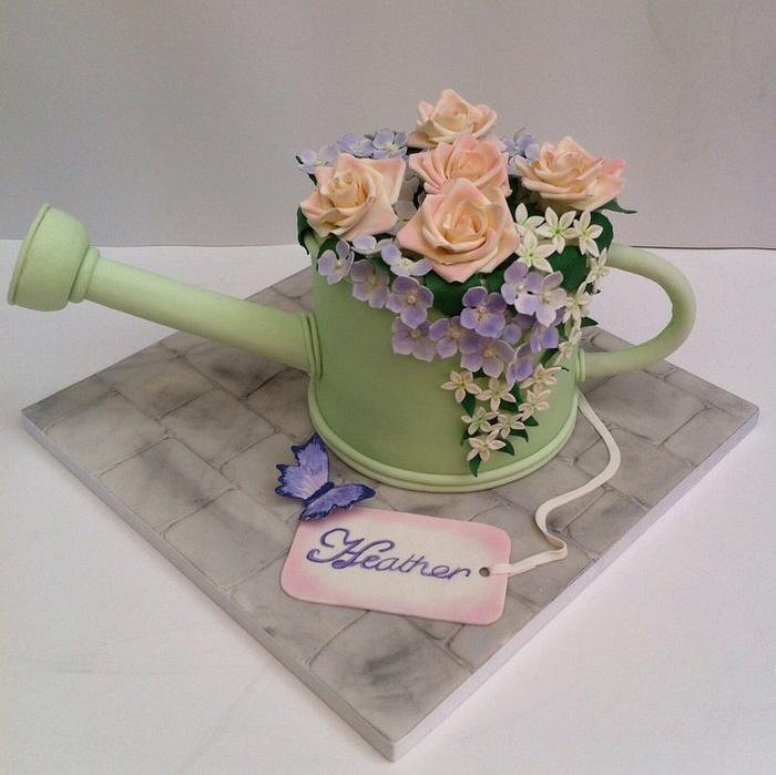 Floral watering can cake