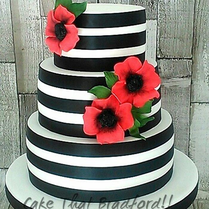 black and white striped wedding cake