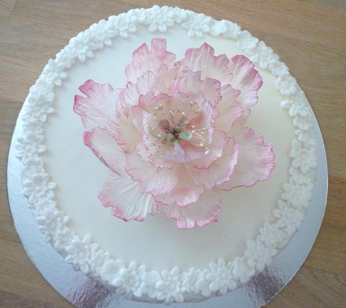 Small wedding cake with sugar flower