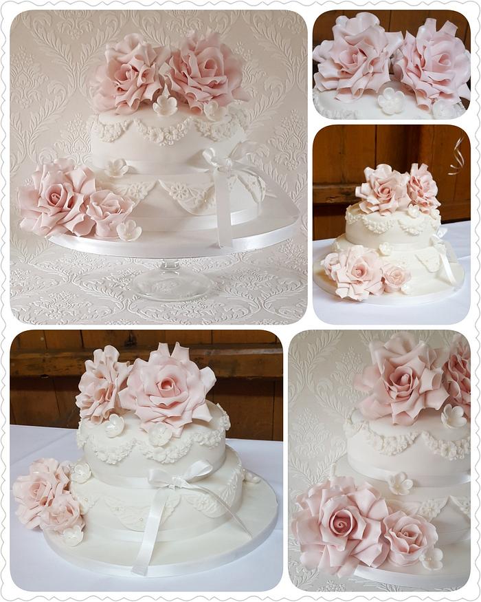 White with a touch of pink wedding cake