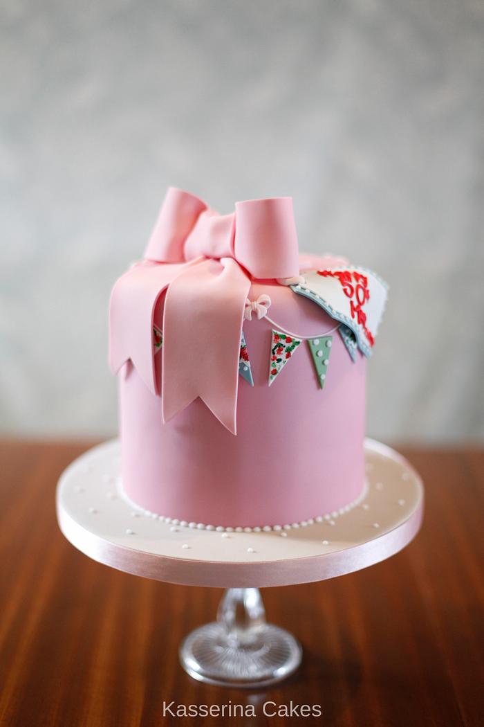 Bow and bunting birthday cake