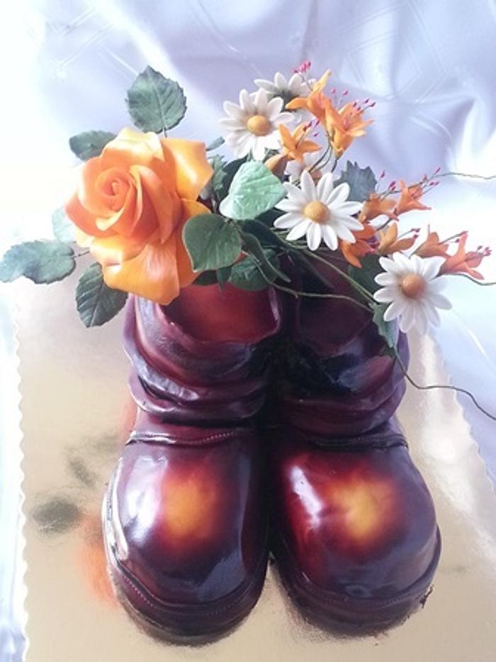 Cake "Old boots with sugar flowers"