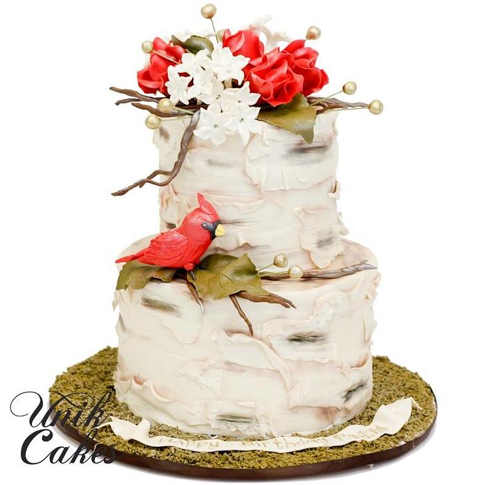 Birch tree stump cake with cardinal and red roses