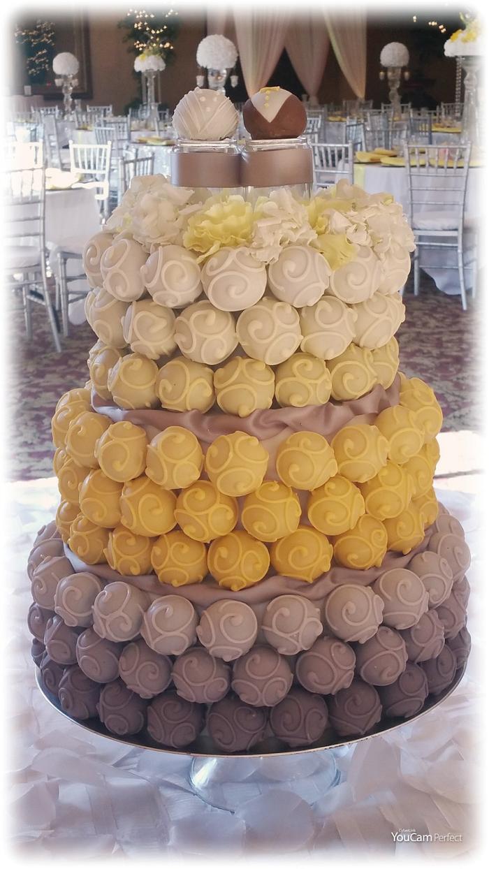 Yellow, gray and white Cake Bite Cake 