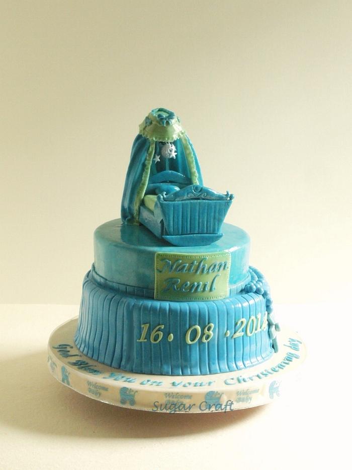 Blue cradle baptism cake