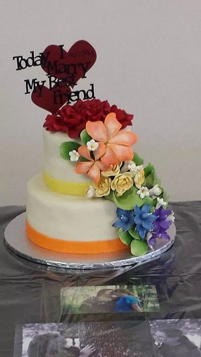 Wedding cake with floral rainbow effect