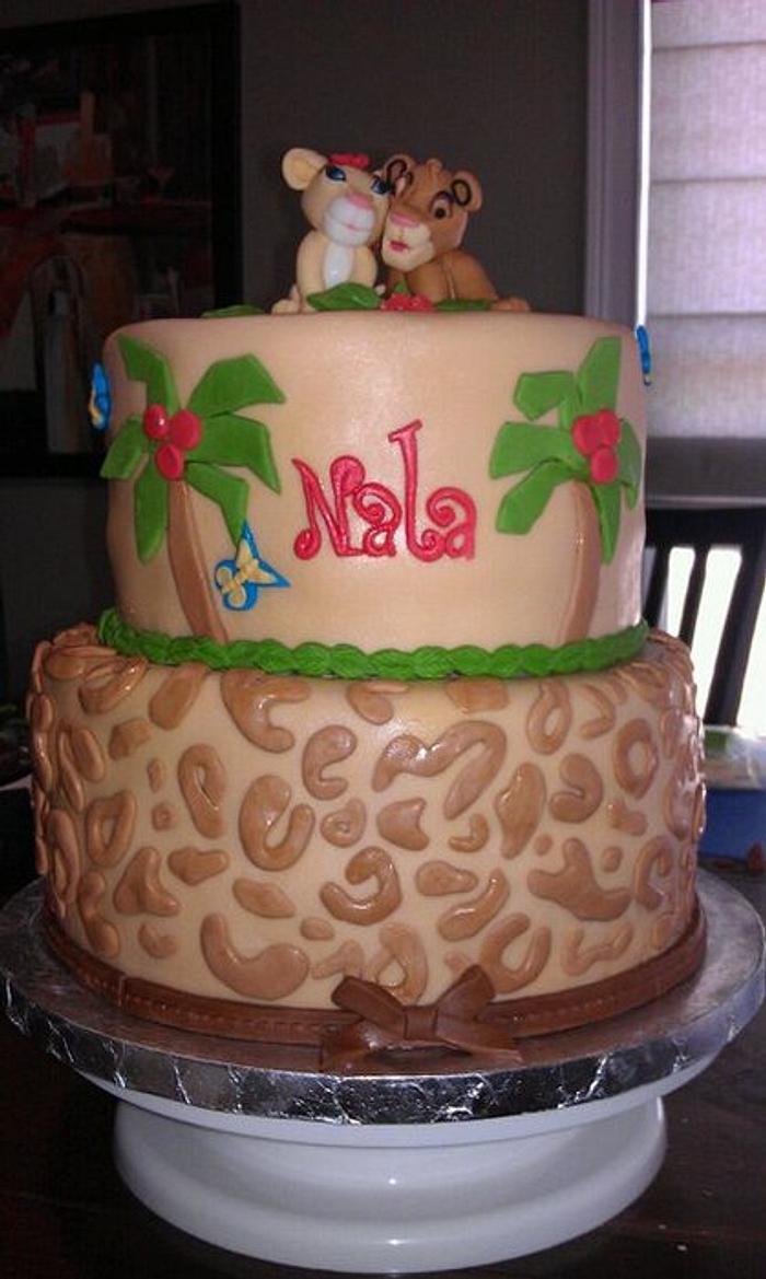 Simba and Nala baby shower cake to match bedding.