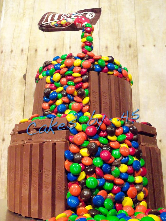 Gravity-defying M&M Vanilla Birthday Cake