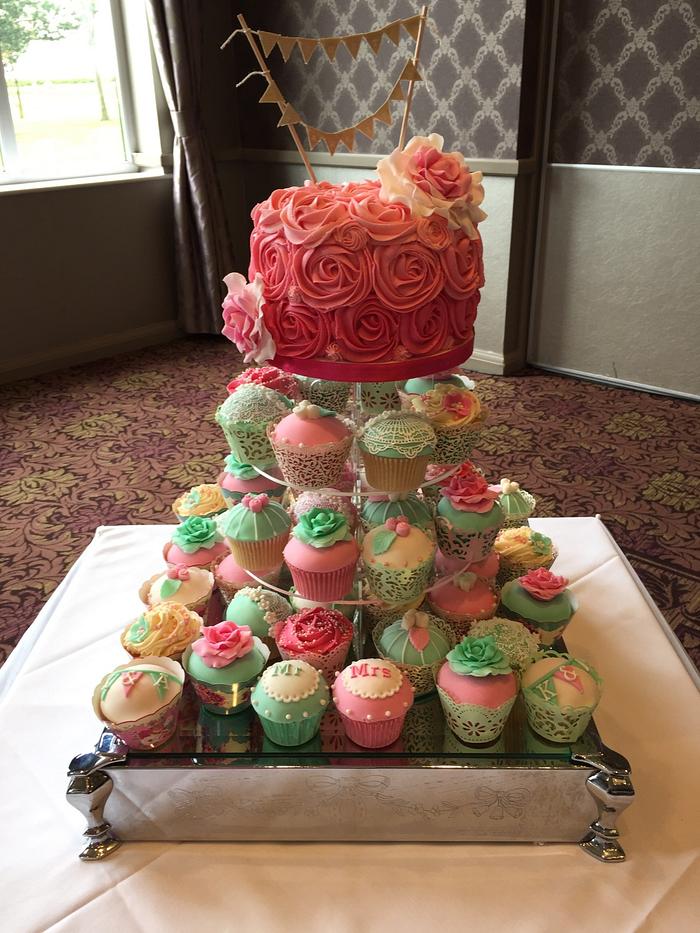 Wedding cake and cupcakes 