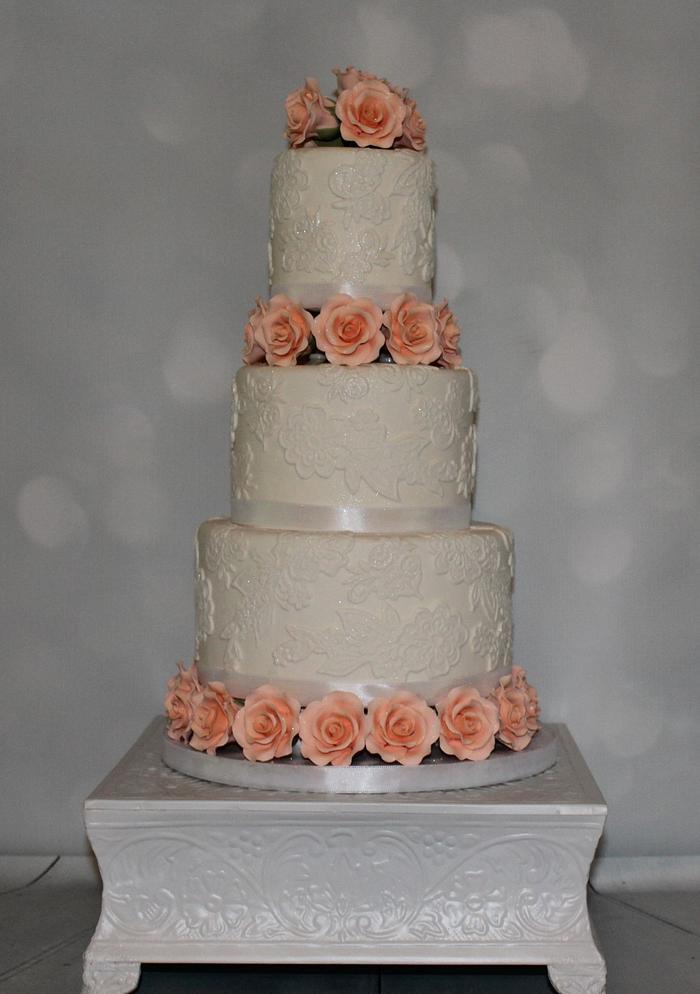Lace and peach roses