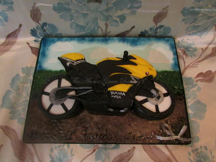 Bumble-bee style motorbike cake.