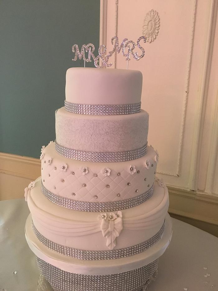 Silver and white wedding cake