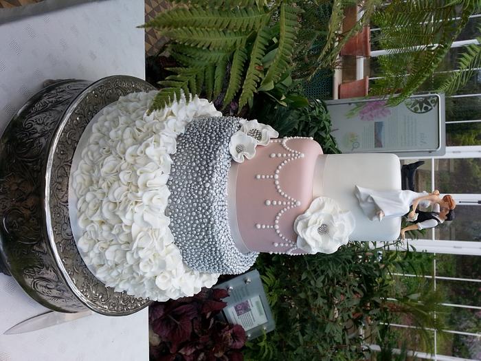 Ruffles and pearls wedding cake