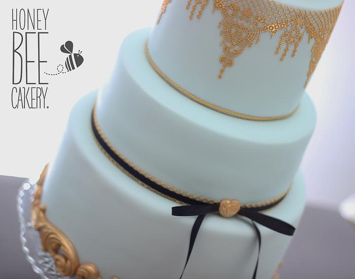 Powder blue & Gold Wedding Cake by The Honey Bee Cakery