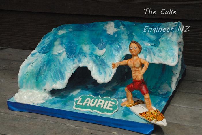 Surfer on a wave cake 