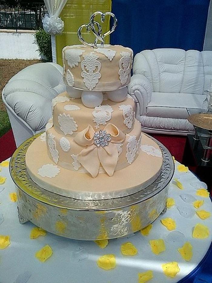 Ivory and lace wedding cake
