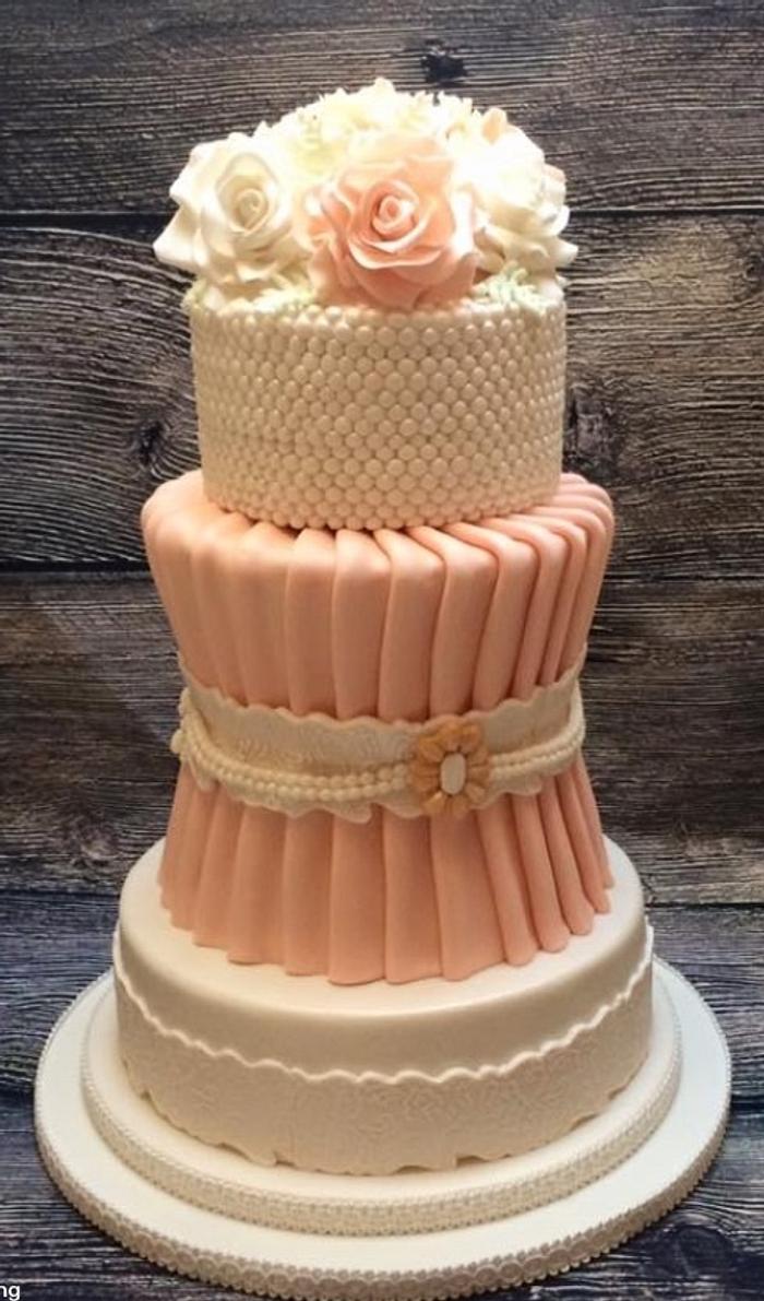 Pleats and pearls wedding cake