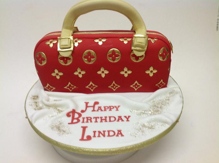 Handpainted LV purse cake, Vanilla and mocha cake replica o…