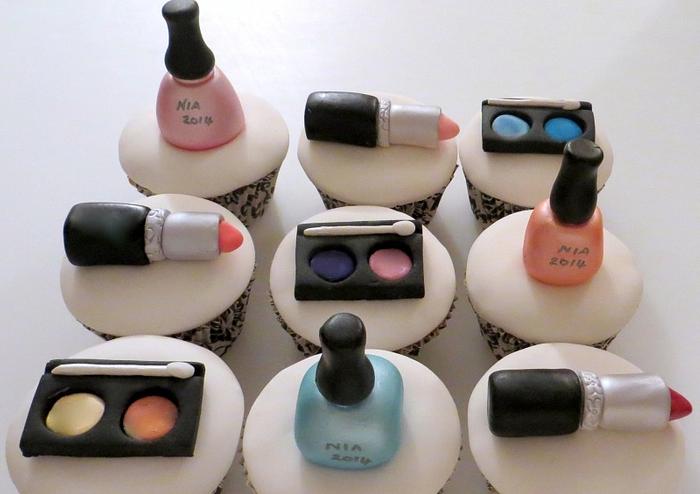 Cupcakes with edible make up toppers