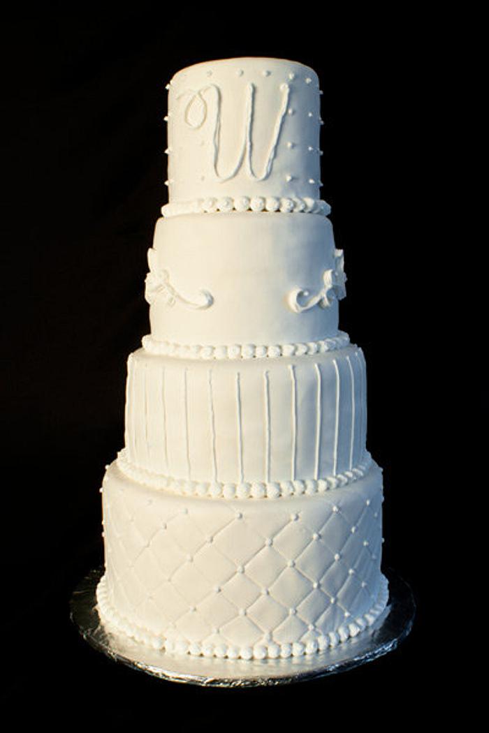 White Four Tiered Wedding Cake