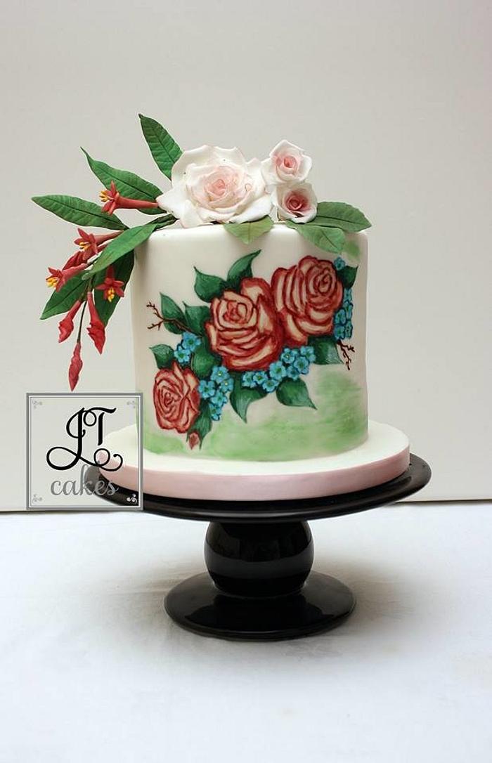 Sugar flowers and hand painted roses.