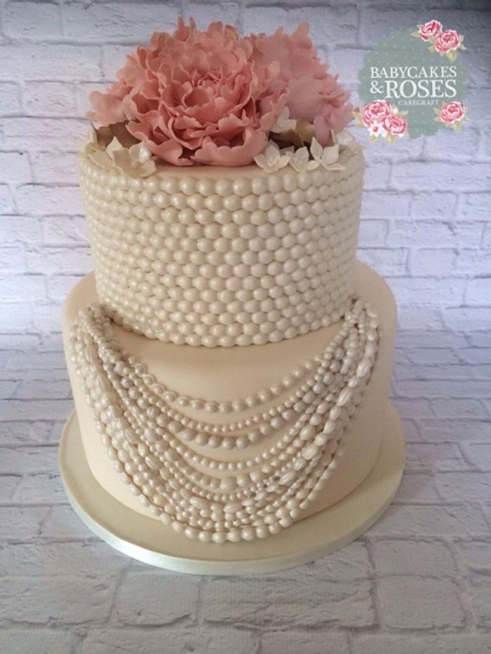 Peach peony & pearls wedding cake