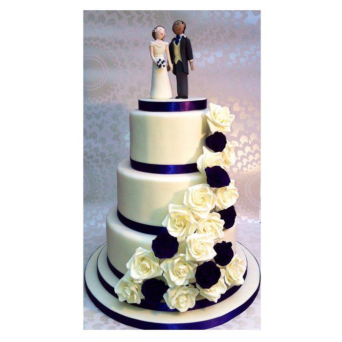 Cream and purple wedding cake